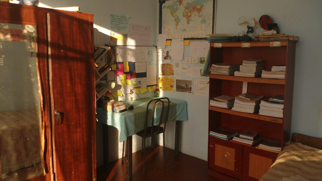 Editorial desk with maps, documents and a magnifying glass