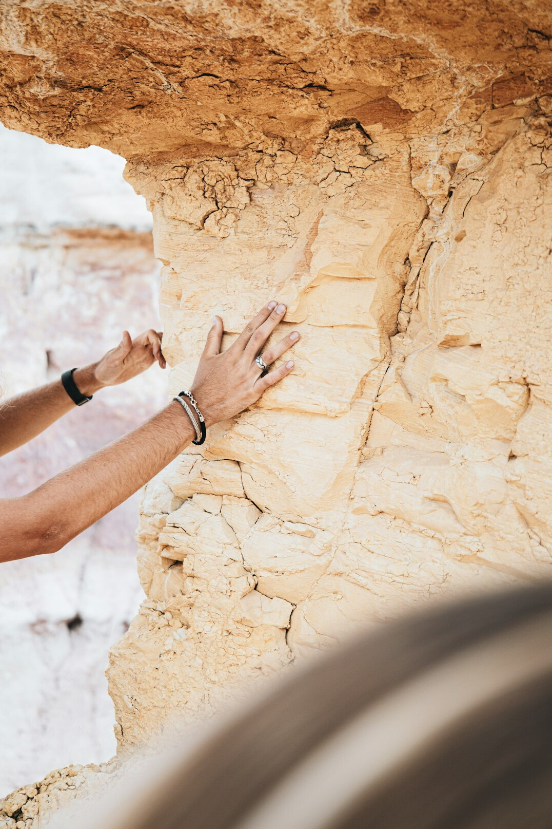 archaeologist examining stone carvings